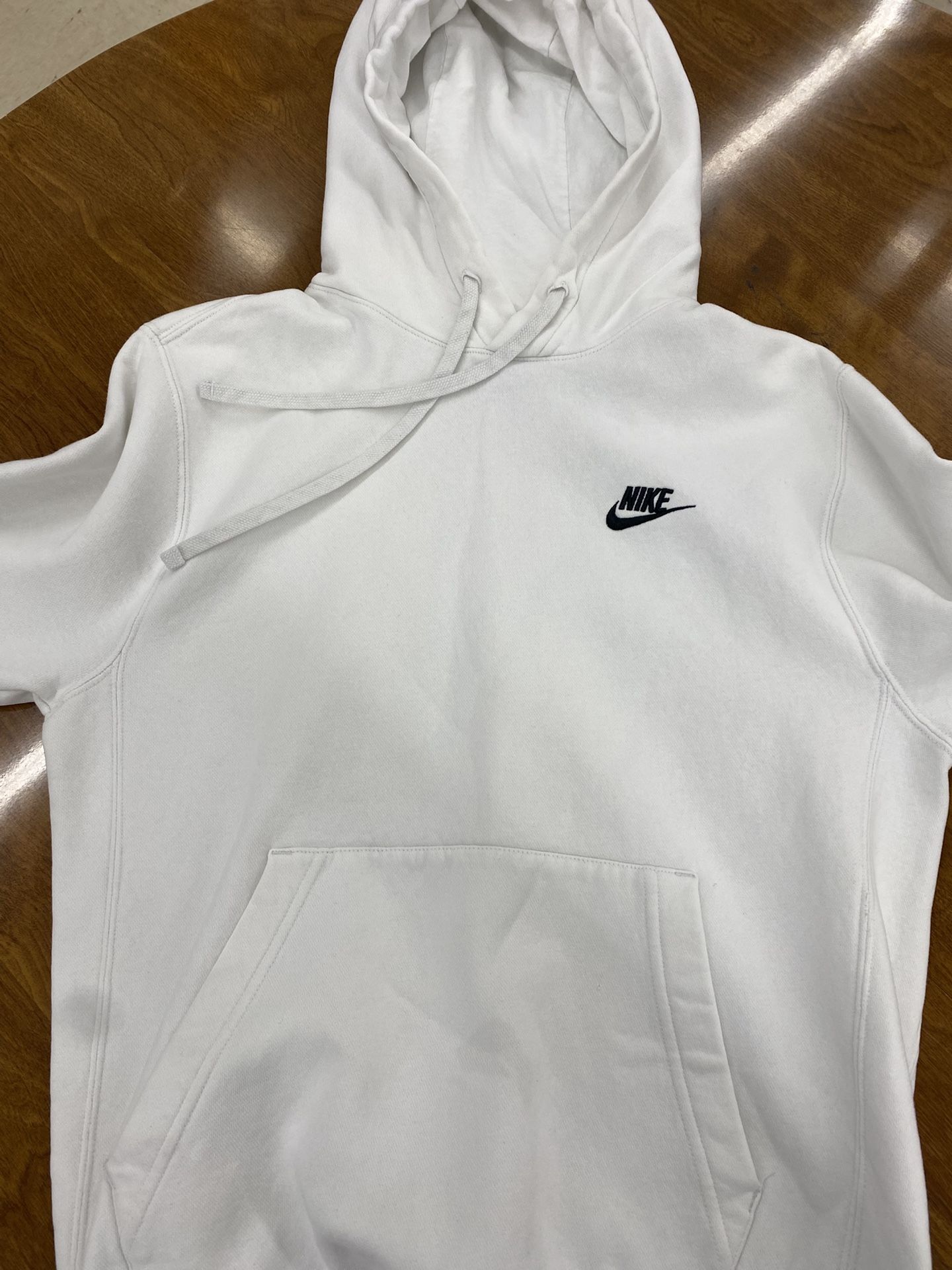 S white Nike sweatshirt
