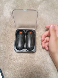 Black, rechargeable electric hand warmers