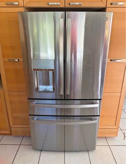 GE Profile 27.9 cu. ft. Smart 4-Door French Door Refrigerator with Door-in stainless steel
