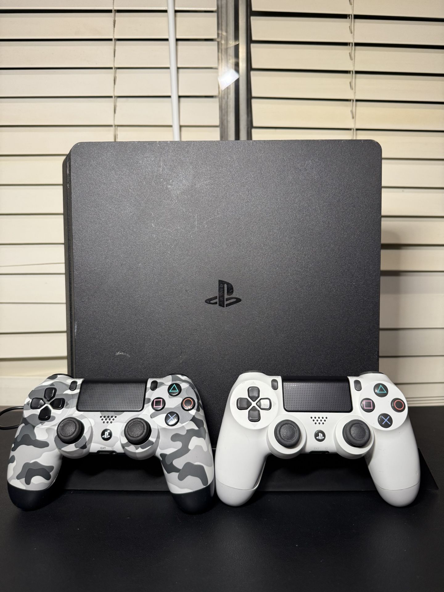 PlayStation 4 Slim 500gb with 2 controllers