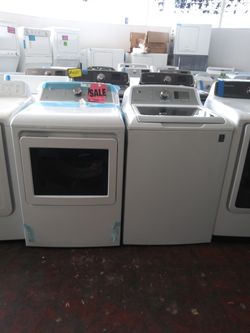NEW scratch and dent GE top load washer and dryer set