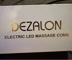 Introducing the Ultimate Electric LED Massage Comb.