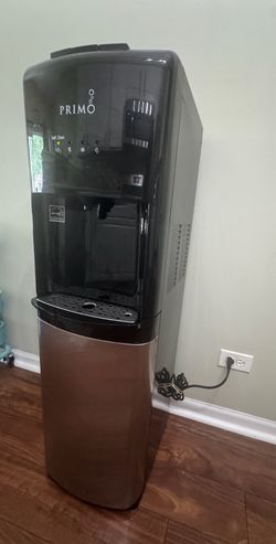 Primo water dispenser + 5 gallon water cans 4nos
