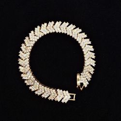 BRAZALETE  DE  ORO  LAMINADO/GOLD-PLATED  BRACELET 