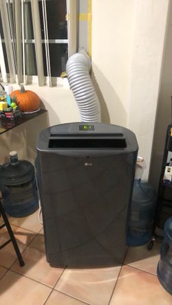LG portable AC 14,000 BTU includes the hose and attached windows