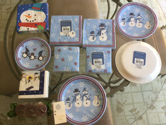 Paper plates and napkins with a set of 3 candles