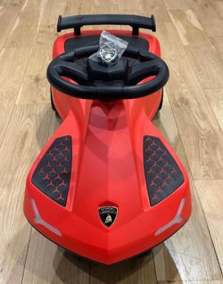 Lamborghini swing car with sound, storage and wheel lights