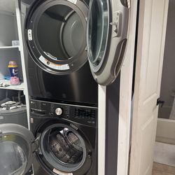 LG ThinQ  washer and dryer set with stainless steel stacking kit