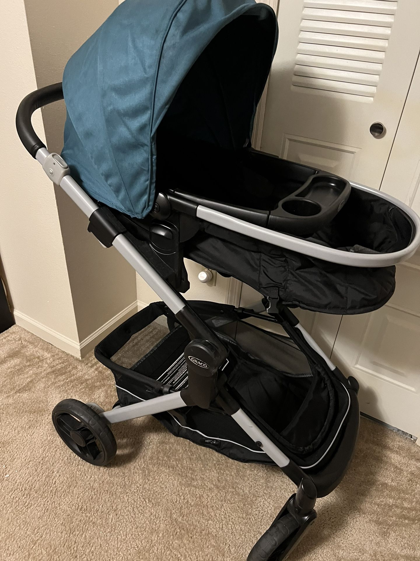 Graco Modes Nest Travel System, Includes Baby Stroller with Height Adjustable Reversible Seat, Pram Mode