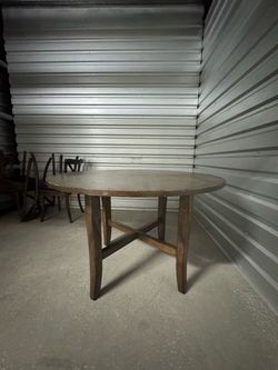 Brown wood dining table w/ chairs