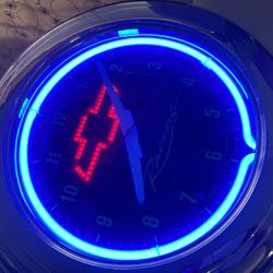Blue neon Chevy emblem clock