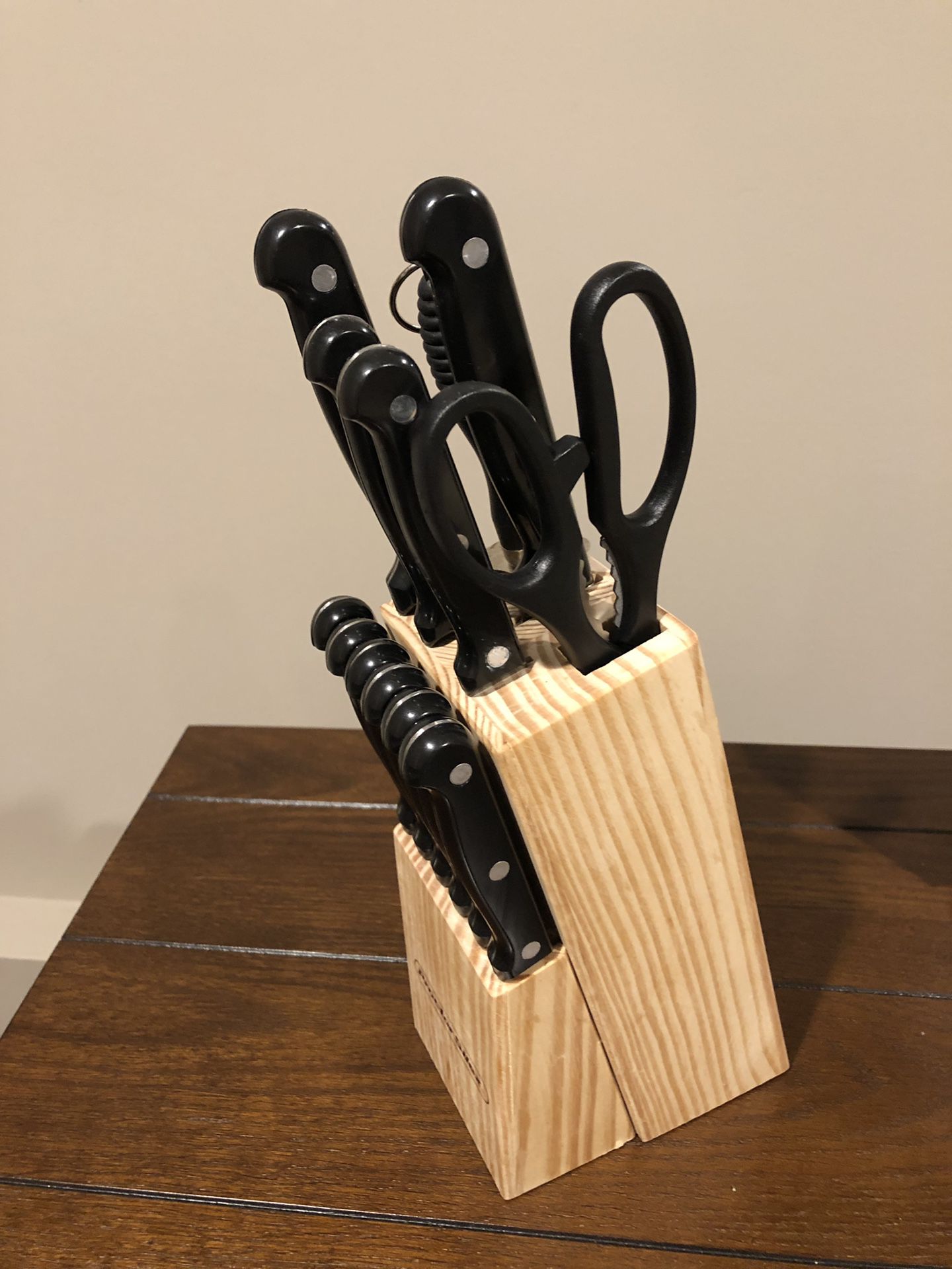 Kitchen knives and wooden block