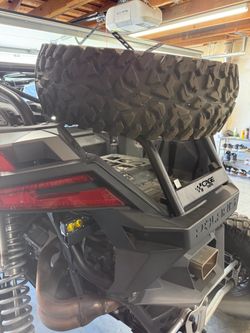 Cagewrx spare tire carrier for rzr pro r