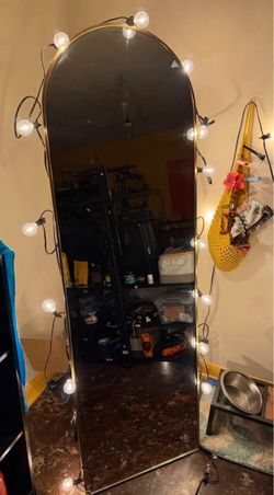 Gold arched full length mirror