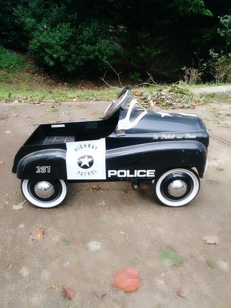 Burns Novelty and Toy Company peddle highway patrol car