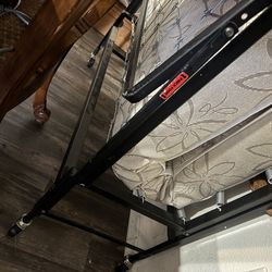 Foldable roll out bed