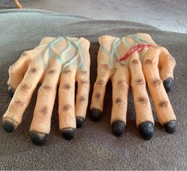Monster Zombie Hands Halloween Scary rubber monster hands with a flesh-toned finish and blue vein detailing. This pair of costume gloves has black fin