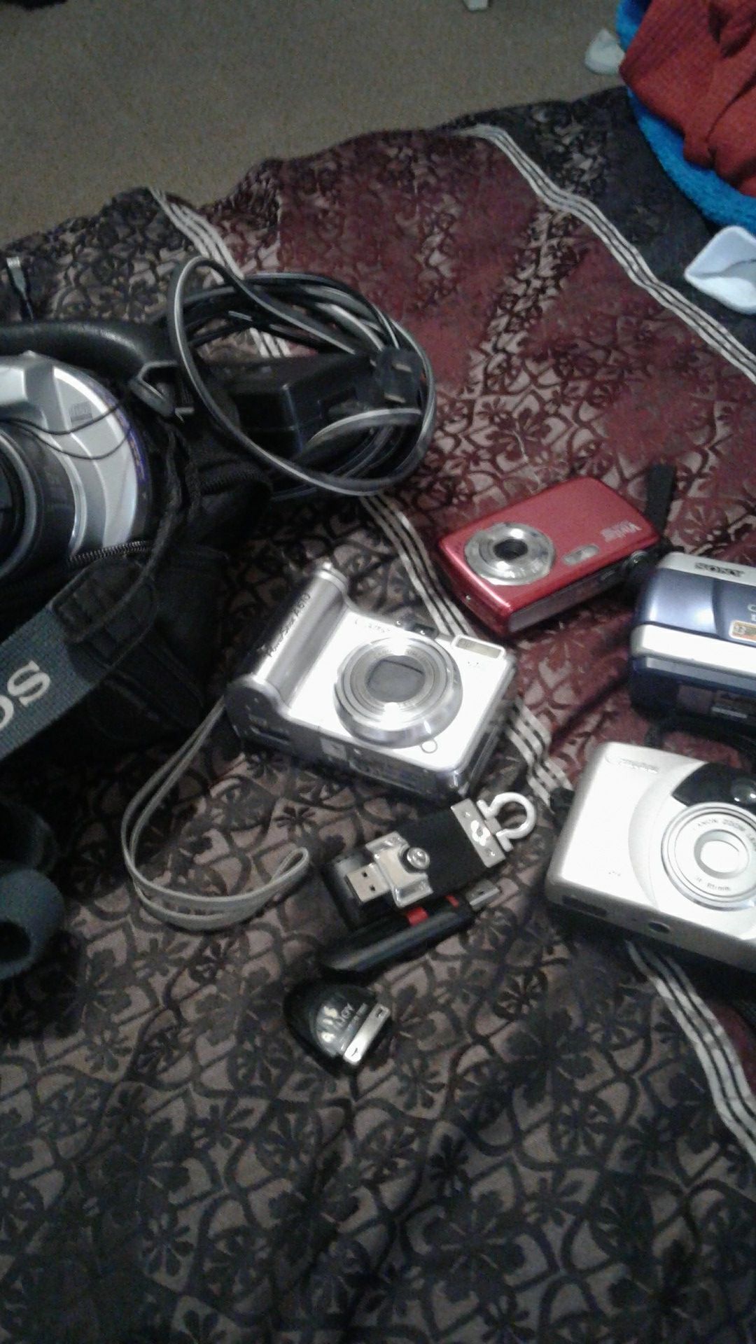 Multiple digital cameras and misc. Items