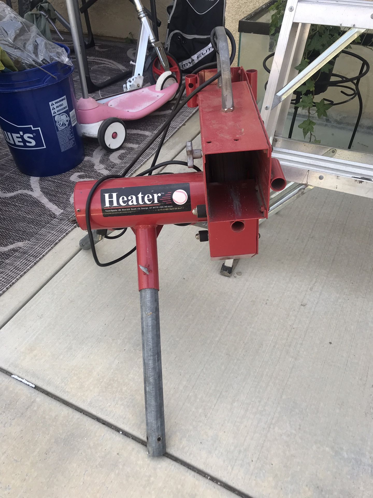 Heater pitching machine