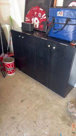 Black cabinet with glass top