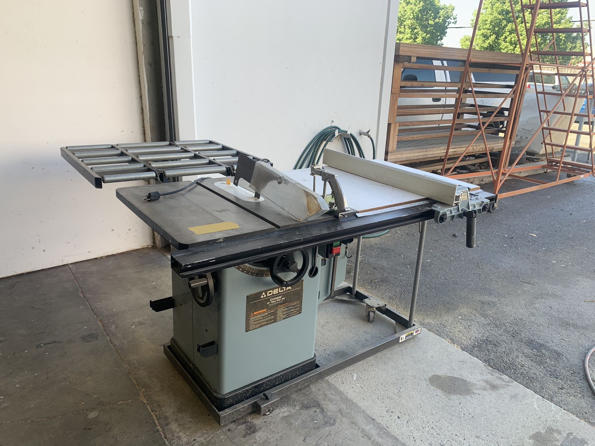 Delta 10” Unisaw tilting arbor table saw with Unifence and portable