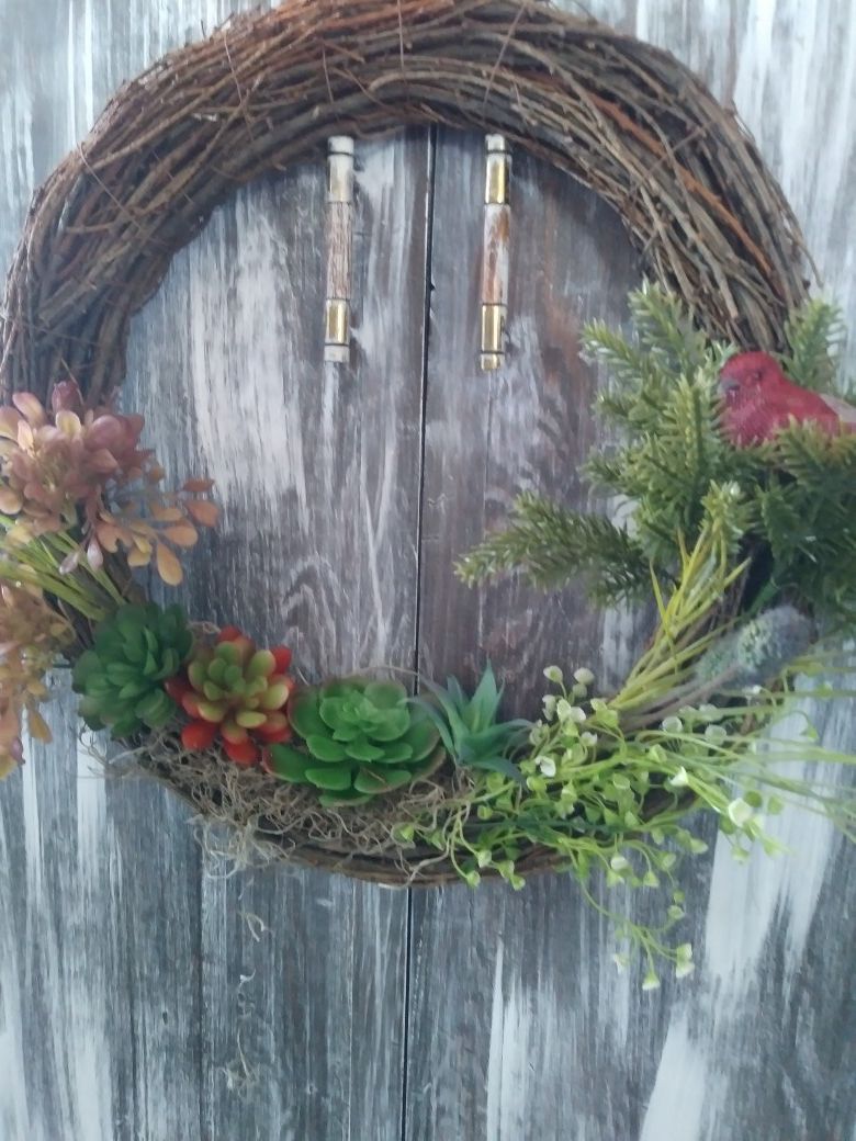 Wreath with succulents and bird