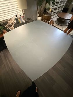 Real wooden dining table with fold in pocket leaf insert and 4 chairs
