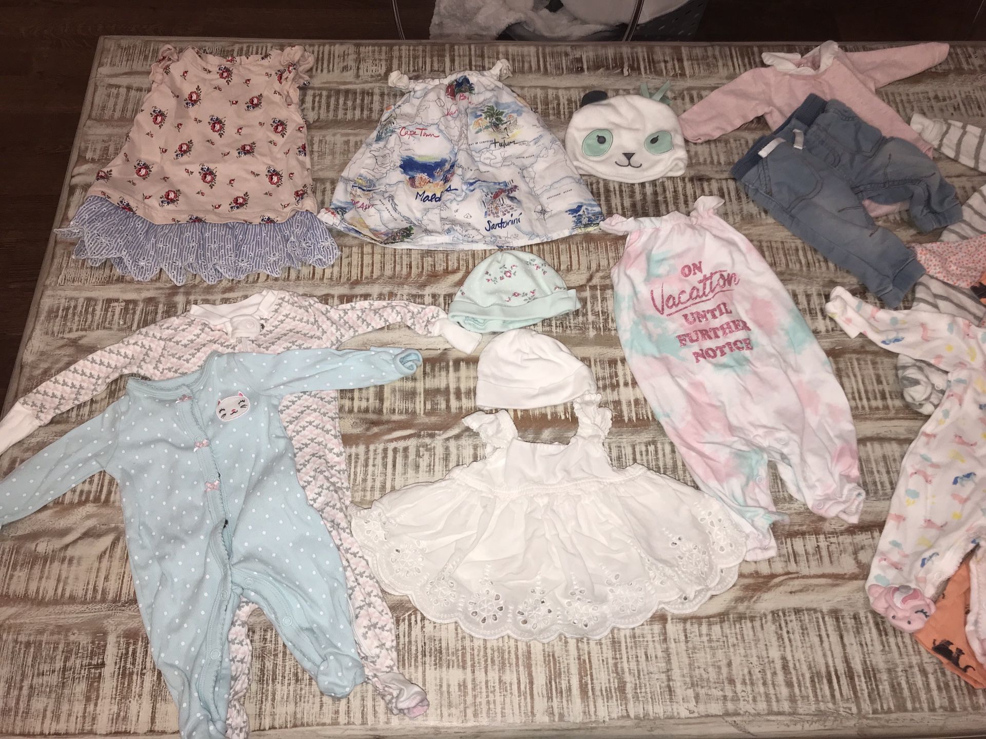 Gently used 34 piece baby girl clothing NB-3months