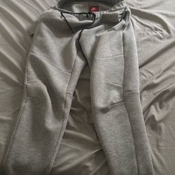 grey Nike Tech Pants Medium 