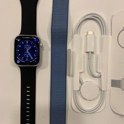 Brand NEW Apple Watch Series 9 GPS 45mm Silver With Winter Blue M/L Size Sport Loop  Comes with charger and  1 year Apple warranty