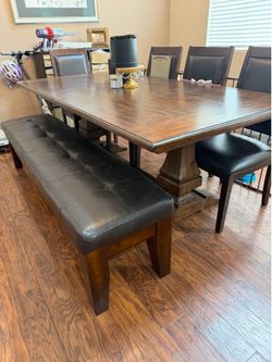 Kitchen table with chairs and bench