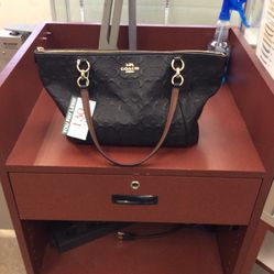 Coach. Purses 
