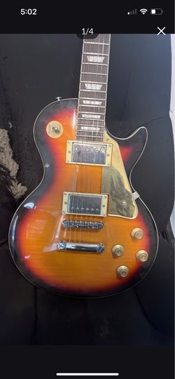 Les Paul style guitar, beautiful finish. Gig bag free.
