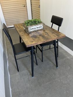 Table And 2 Leather Chairs 