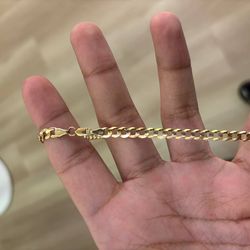 14 kt Cuban link gold chain
