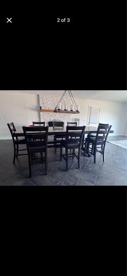 Large dining table with 12 matching chairs