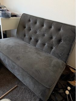Small grey soft sofa