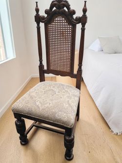 Stunning Antique carved wood high-back chair with intact handwoven cane back. 48" Tall-#1188