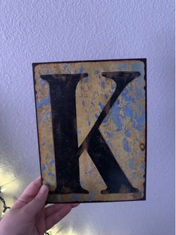 K sign
