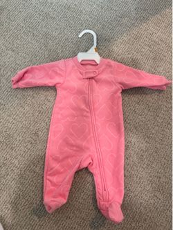 Pink heart newborn zip onsie