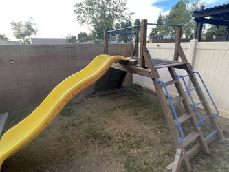 Slide With Rock Climbing Wall