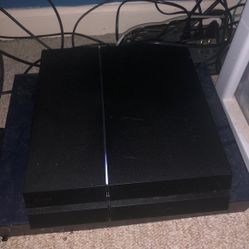 PS4 With Controller And Games