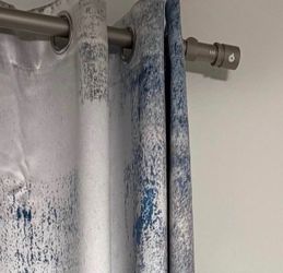 Brushed nickel curtain rod