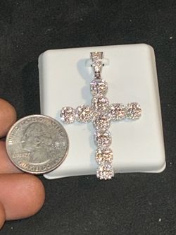 Moissanite iced out VVS D1 color cross with flower cluster design.