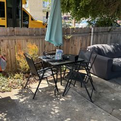 Patio Furniture W/ Umbrella (stuff On Table Not Included)