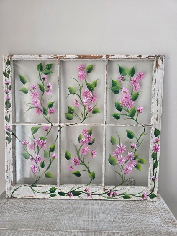 painting flowers on a vintage window fram Aet