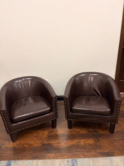 Pair of Brown Leather Barrel Accent Chairs