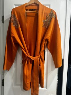Orange Knit Cardigan with Gold Floral Embellishments