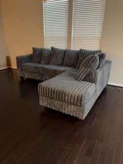 Need Gone new In Box  Fluffy L Shape Sectional Gray $50DONW 