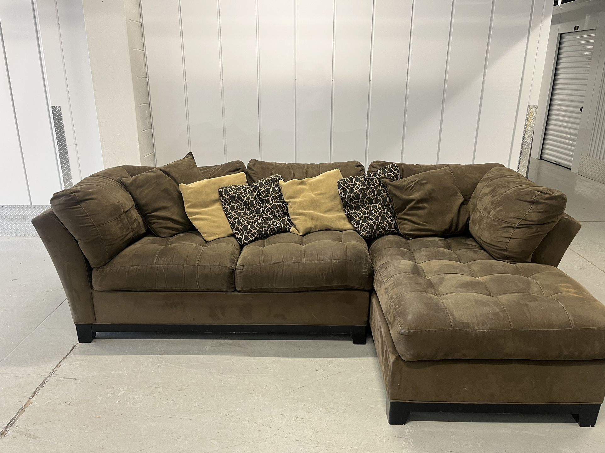 $700 OBO Brown sectional w/ right chaise + pillows.